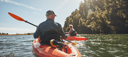 Older couple out kayaking